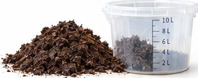 Illustrative mature compost beside a measuring bucket, not a predicted final yield