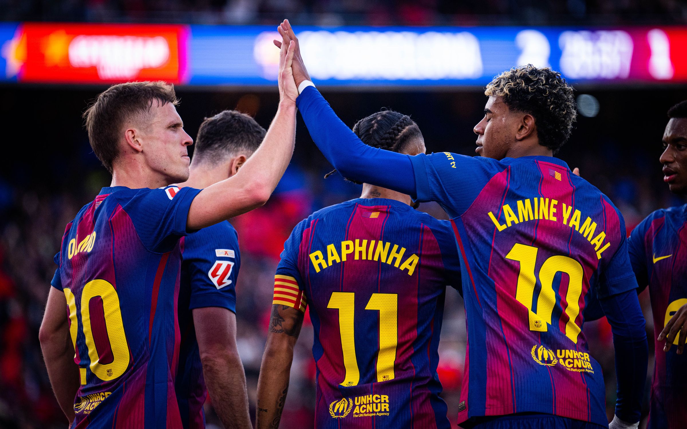 FC Barcelona players including Raphinha and Lamine Yamal celebrating together in an archive photograph